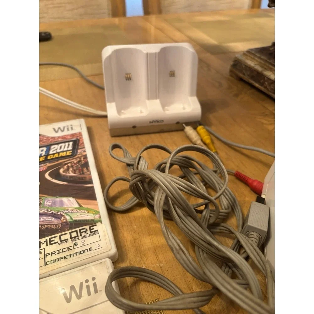 Nintendo Wii Console bundle + 5 games w  2 remotes 3 nunchucks wires and charger
